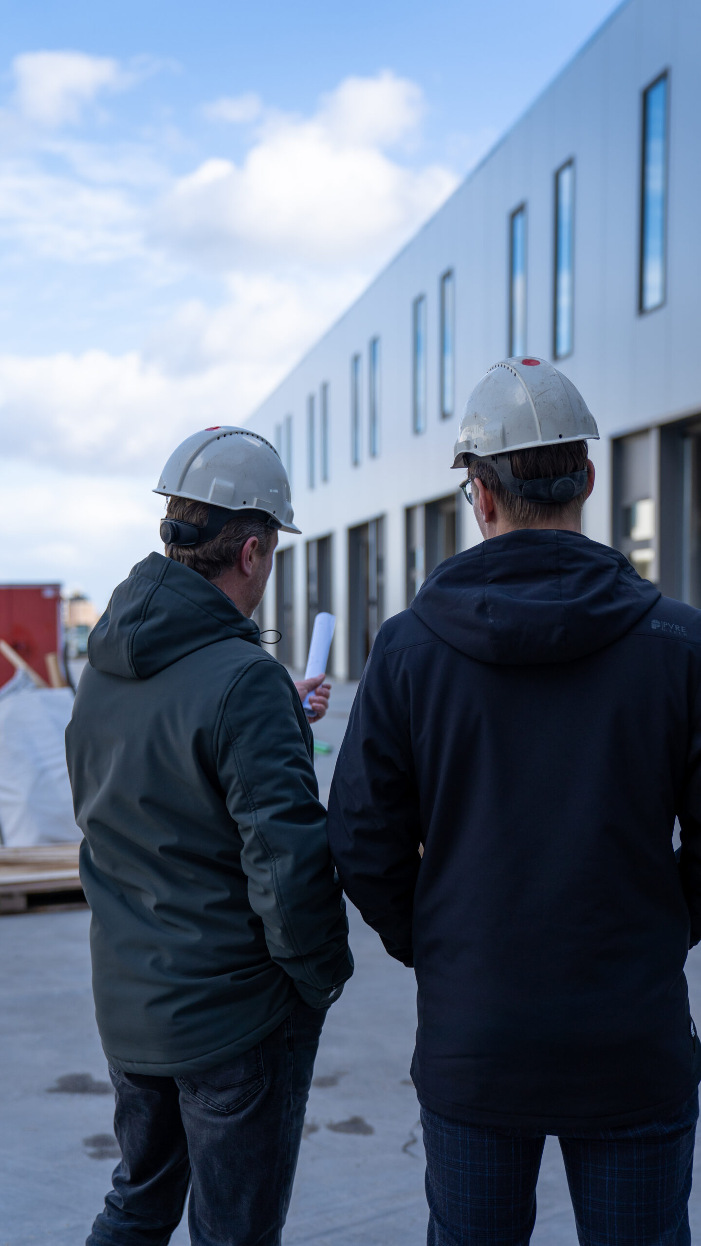 Bouwmannen op bouwplaats
